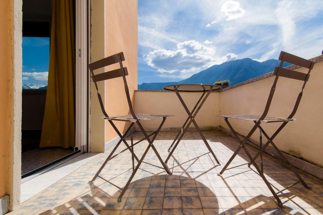 Al Pontile - The House Of Travelers Villa Sala Comacina Buitenkant foto