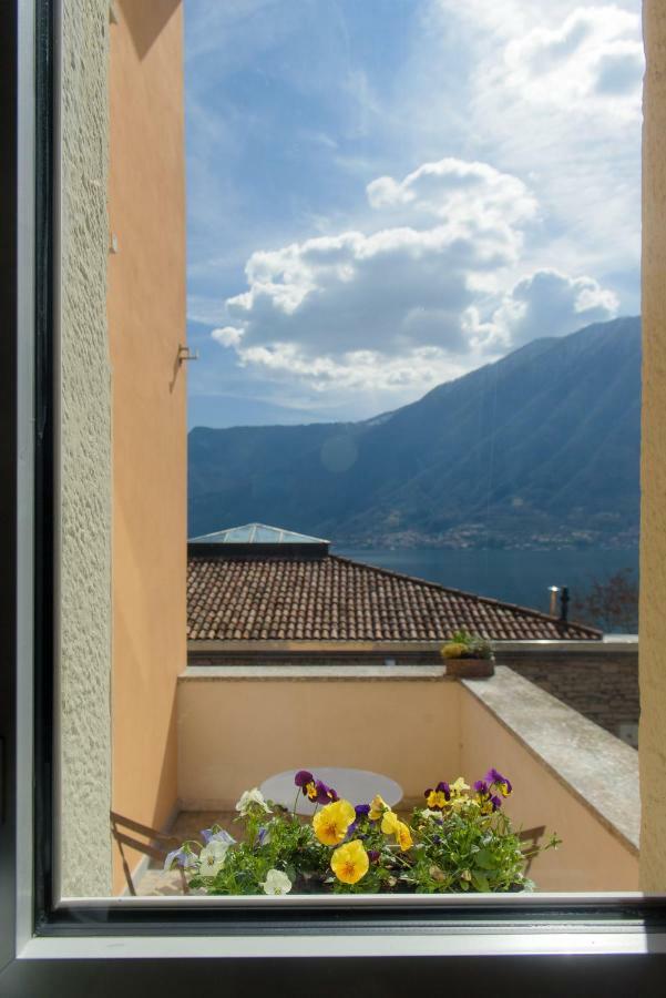 Al Pontile - The House Of Travelers Villa Sala Comacina Buitenkant foto