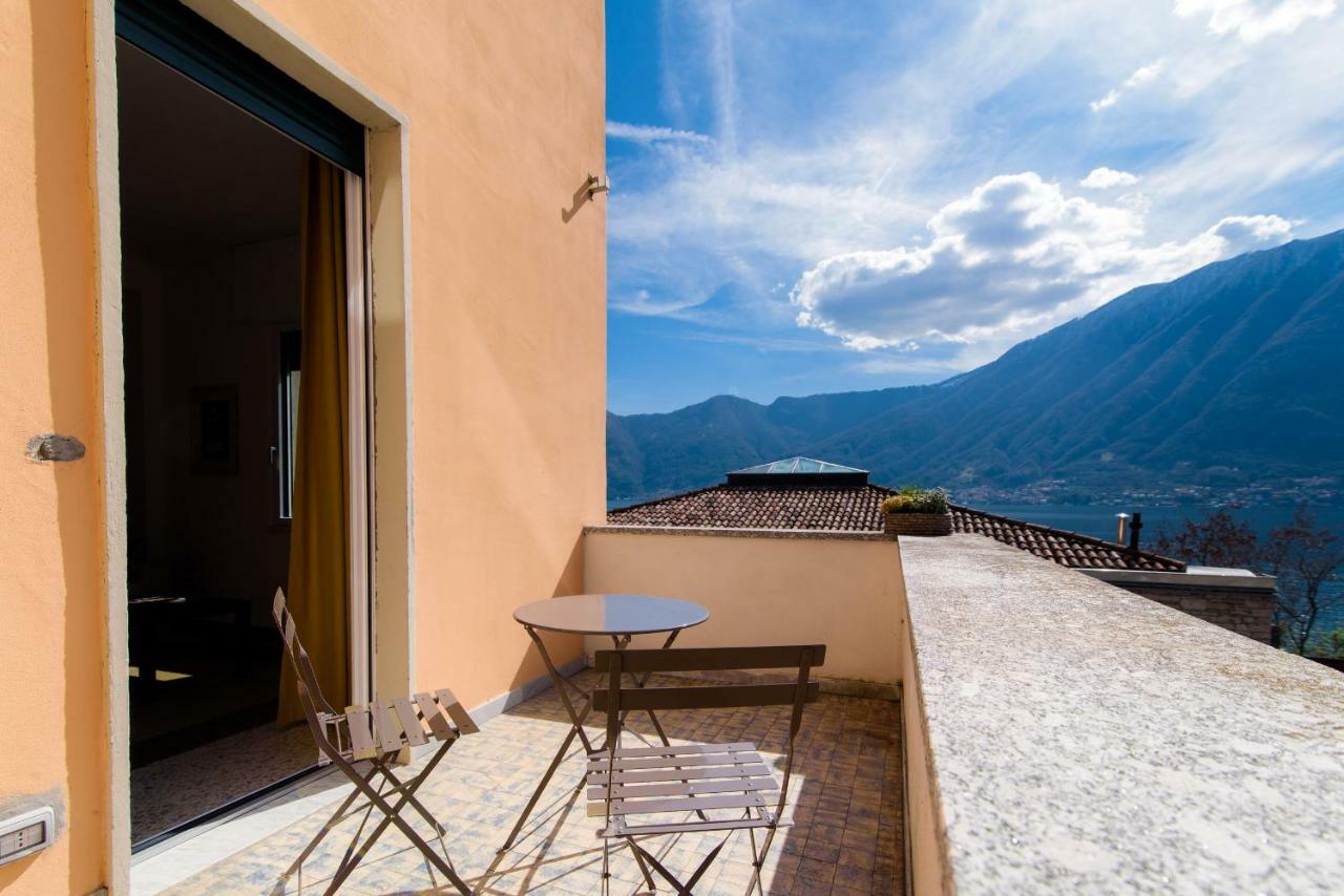 Al Pontile - The House Of Travelers Villa Sala Comacina Buitenkant foto