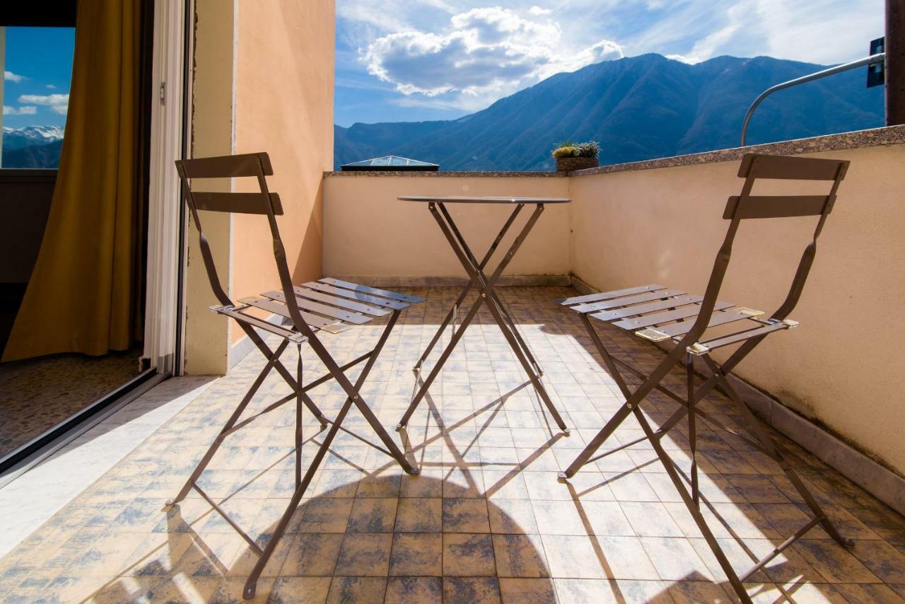 Al Pontile - The House Of Travelers Villa Sala Comacina Buitenkant foto
