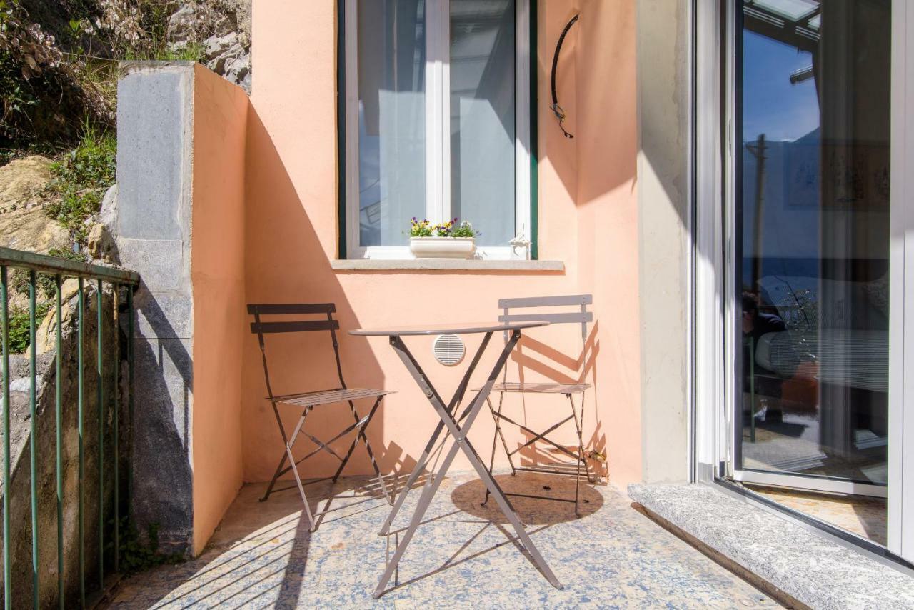 Al Pontile - The House Of Travelers Villa Sala Comacina Buitenkant foto